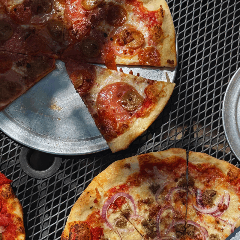 Boise pizza delivery|order pizza online|NY style pizza Boise|Wiseguy Pizza Pie|Half Baked pizza|best pizza Hailey|Ketchum pizza|pizza takeout Boise|calzones and wings|stone deck oven slices