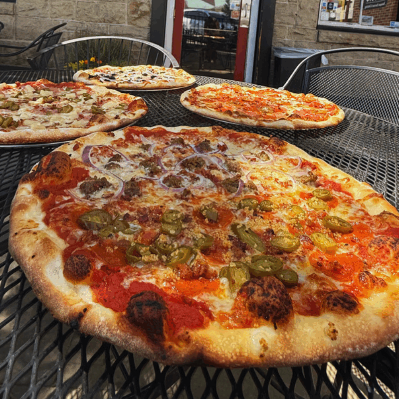Wiseguy Pizza|Boise pizza|NY pizza Boise|draft beer Boise|patio dining Boise|Ketchum pizza|order pizza online|Half Baked pizza|pizza by the slice|calzones&hoagies|stone deck oven|Idaho|wings