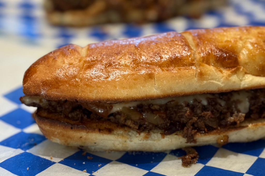 melty cheese pizza | stacked pizza toppings | Wiseguy Pizza Pie Boise | mouthwatering pizza Idaho | irresistible pizza Boise | pizza crust perfection | best pizza Boise | pizza slices